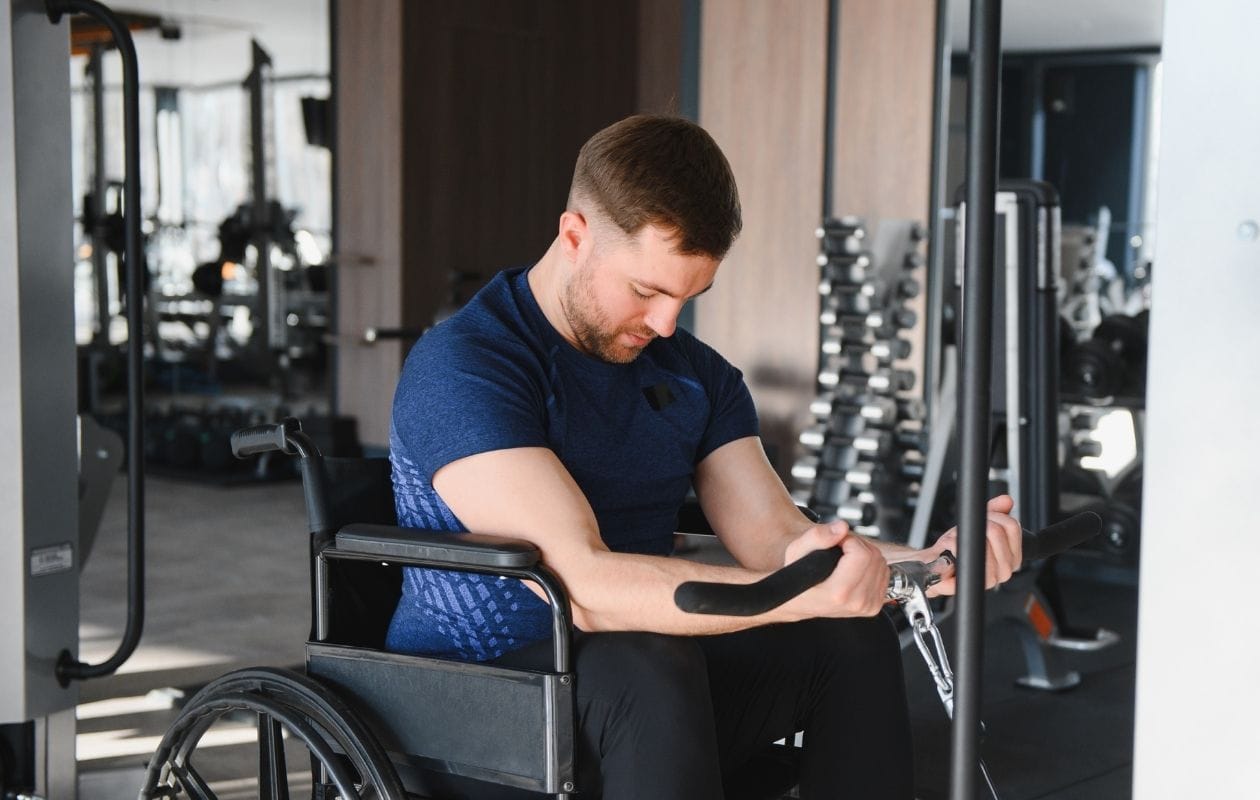 Man performing a seated bicep curl